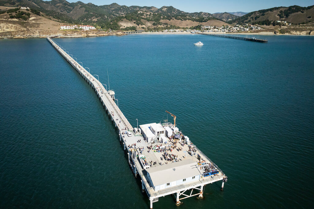 Aerial photo shows the Cal Poly pier extending into Morro Bay
